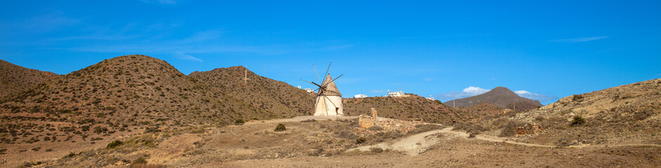 panorama desert landscape and windmill