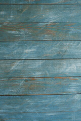 Fototapeta premium Vintage blue wood background texture with knots and nail holes. Old painted wood wall. Blue abstract background. Vintage wooden dark blue horizontal boards. Front view with copy space. 