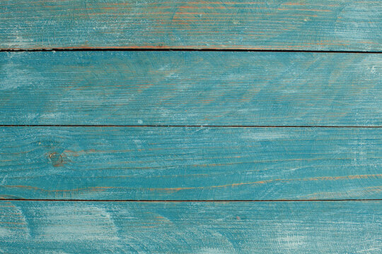
Vintage blue wood background texture with knots and nail holes. Old painted wood wall. Blue abstract background. Vintage wooden dark blue horizontal boards. Front view with copy space. 