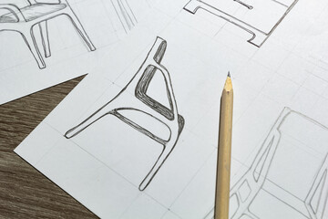 Design sketches of furniture chairs on paper. - 531657509