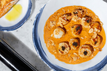 Grilled sea scallop with black caviar