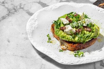 Bruschetta with avocado and anchovies