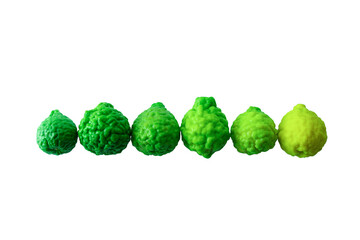 Green and yellow bergamot kaffir lime isolated on white background with clipping path