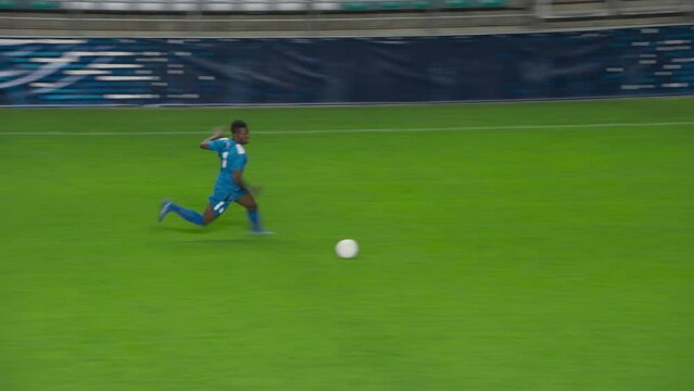 Soccer Football Match Championship: Blue Team Players with Attacker Forward Leading and Scoring Perfect Goal with Goalkeeper Missing the Ball. Sport Channel Broadcast Television, Tracking Playback