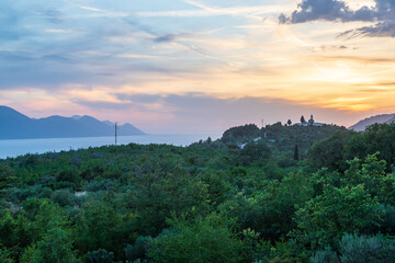 Seaside landscape in the sunset. Region Croatia - Duba - Europe. Sea, boats and sunset.