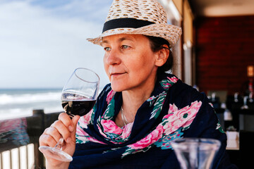 A woman with a glass of wine