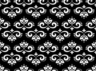 Flower geometric pattern. Seamless vector background. White and black ornament
