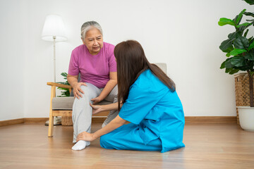 physiotherapist doctor or caregiver helping senior older woman stretching his hamstring and doing thigh or leg rehabilitation in exercise room, Osteoarthritis of the Knee and caregiver concept