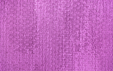 Background from decorative plaster with abstract patterns and stains. Fancy red and pink decoration wall texture, creative purple surface background. Finishing coating for building cladding.