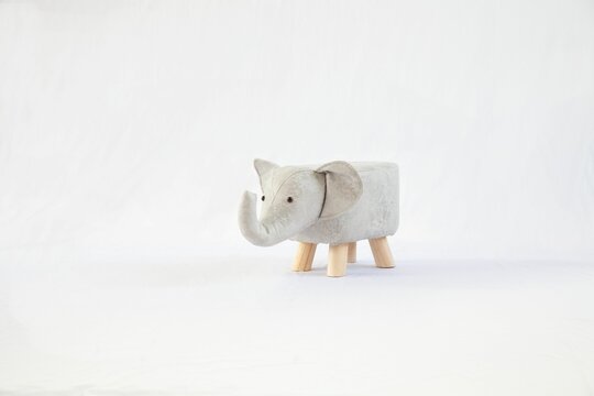 Closeup shot of a white elephant toy isolated on a white background