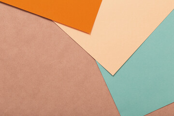 multi-colored paper background from several sheets of cardboard