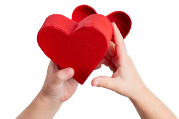 Fototapeta premium Beautiful closeup of kid hand red heart on white background. Shape background.Holiday background. Creative design