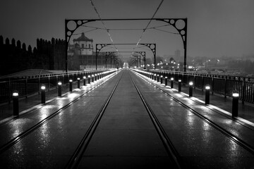 Night view of the Dom Luis I Bridge, Porto, Portugal. Black and white photo.