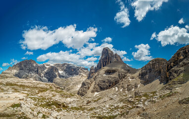 Panoramic hiking trail along the Tirol Sexten mountain chain during summer time