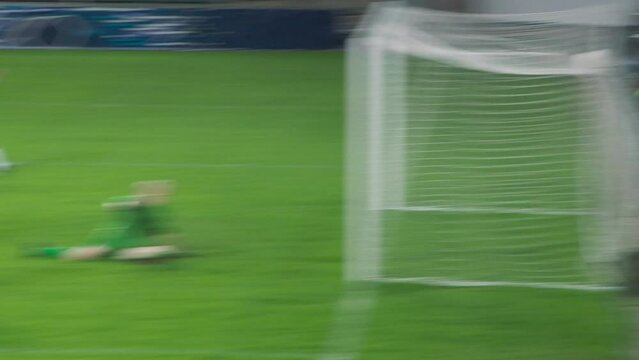 Soccer Football Championship: Blue Team Forward Attacks and Scores Goal, Win the Match, Players Celebrate Victory, Win Major League Cup. Sport Channel Broadcast Television Playback. Tracking Pan Shot
