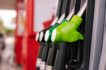 Detail of fuel pumps in european gas station - inflation, rising prices, economy, speculation concept - obrazy, fototapety, plakaty