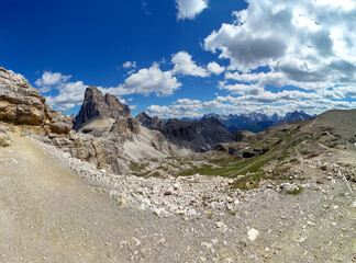 Panoramic hiking trail along the Tirol Sexten mountain chain during summer time