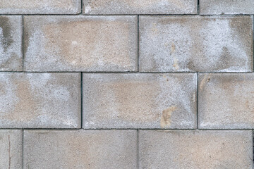 a grey concrete brick wall background texture