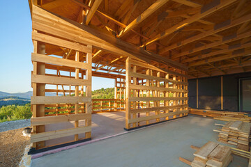 Construction of ecological renewable low energy sustainable wooden eco house.