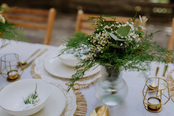 High angle view of aesthehic setting wedding table with flowers at backyard.