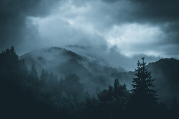 Cinematic view of fog in the mountains Dark and dramatic landscape Cinematic view of fog in the mountains Dark and dramatic landscape Rainy season and climate change