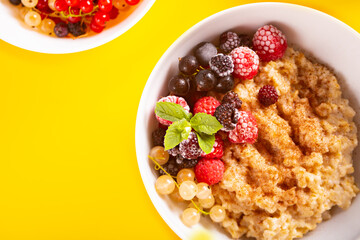 Oatmeal cereal porridge with fresh berries. Healthy breakfast.
