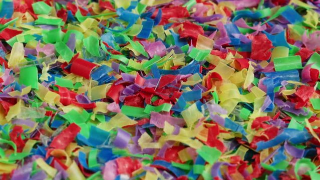 Microplastic pollution, plastic particles top view rotating, garbage and trash, ecological problems. Global warming and climate changing.