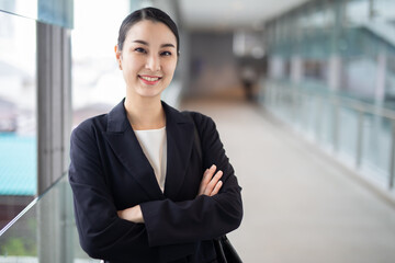 Asian business woman smiling looking camera, Fashion business photo of beautiful girl in casual suite 