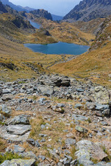 Mountains lakes Claret and Longuet seen form the path to Lake David in La Pra mountains