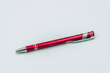 a red pen a white background