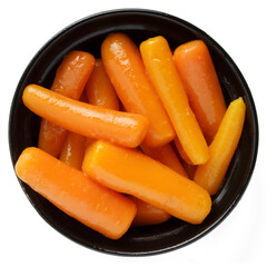 Boiled canned carrots in a bowl isolated on white background. View from above