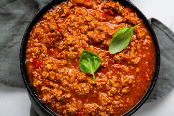 Traditional italian bolognese sauce in saucepan for pasta top view cooking food