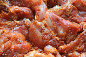 Close-up on marinating pieces of meat. Cooking.