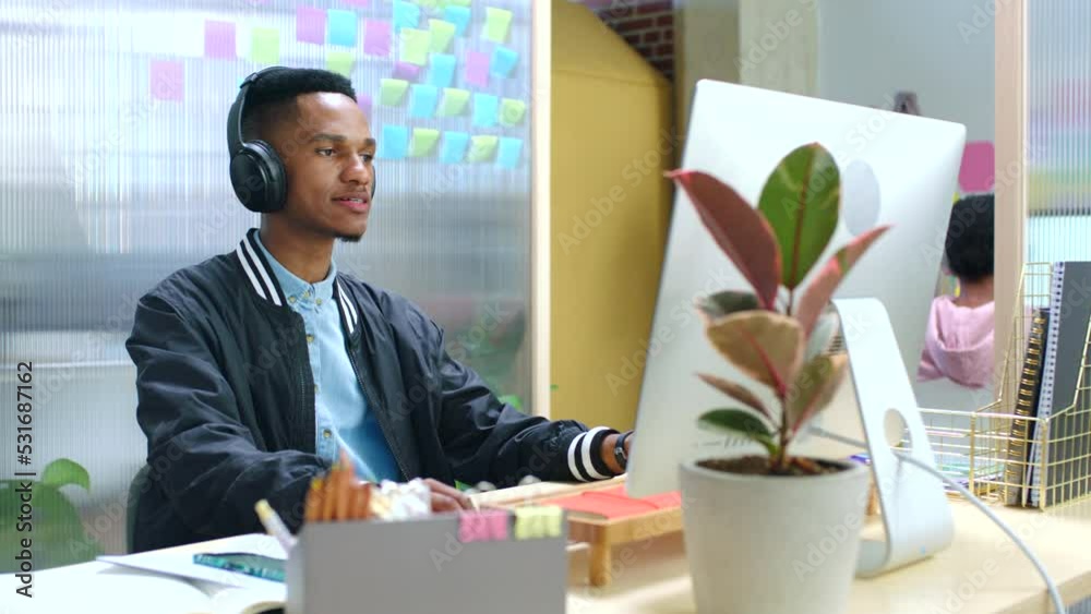 Poster music, design and marketing with a busy office and creative business man working on a computer. coff