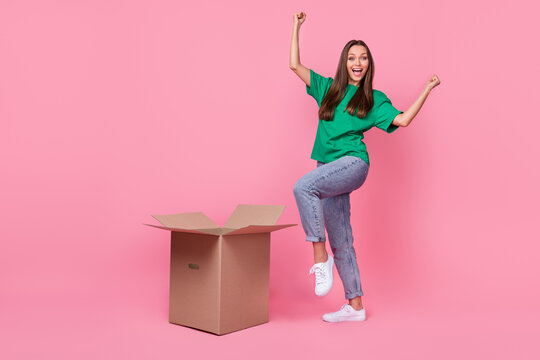 Full size photo of delighted overjoyed girl raise fists luck triumph isolated on pink color background