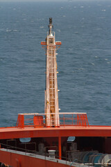 View of the foremast of a merchant ship at sea