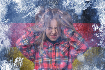 Teenage girl on frozen background with flag of Germany. Concept of crisis in Europe in winter....