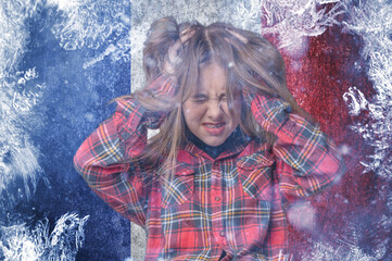 Teenage girl on frozen background with flag of France. Concept of crisis in Europe in winter....