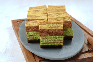 Fototapeta na wymiar Lapis legit or spekkoek or Thousand Layer Cake, A traditional Indonesia’s Top Traditional Cake is a must for special celebrations such as Chinese New Year, Christmas, or Eid