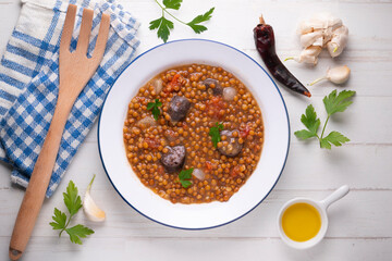 Lentils with chorizo ​​and black blood sausage. Typical Spanish recipe north of Spain.
