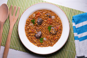 Lentils with chorizo ​​and black blood sausage. Typical Spanish recipe north of Spain.