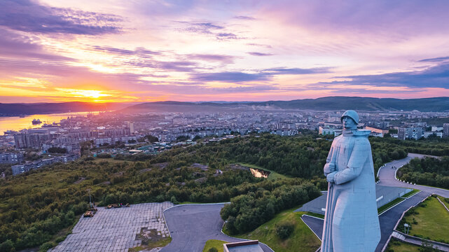 Murmansk, Russia - July 16, 2022: Aerial view panorama of city monument Defenders of Soviet Arctic Alyosha