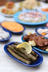 
​Meze or mezze is a selection of small dishes served as appetizers in much of West Asia, Middle East, and the Balkans. Meze is often served as a part of multi-course meals.
