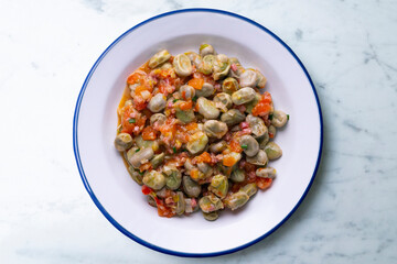 Beans with ham. Typical Spanish tapas recipe.