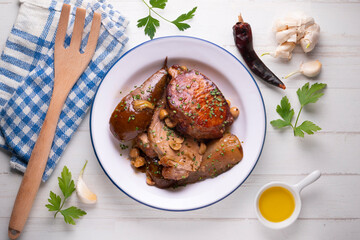 Roast pork loin with pear. Typical Spanish tapa recipe.