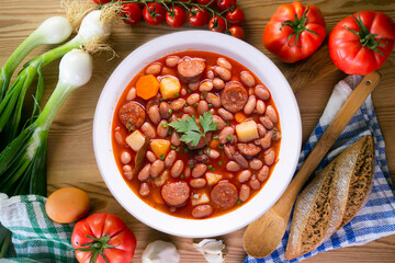 Asturian bean stew. Traditional recipe from the north of Spain with broad beans and chorizo.