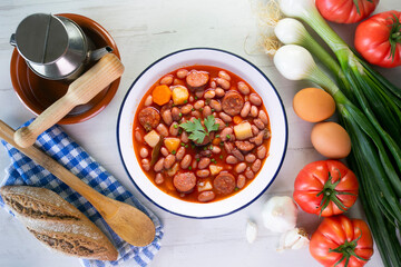Asturian bean stew. Traditional recipe from the north of Spain with broad beans and chorizo.
