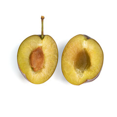 ripe plums isolated on white background, fruit in section