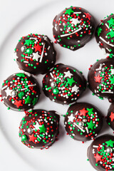 Christmas handmade chocolate balls with holiday sprinkles. DIY holiday gift.