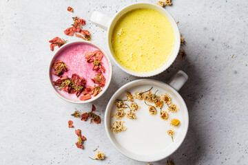 Different types of moon milk: rose flower, golden turmeric and chamomile. Ayurveda drink, healthy lifestyle, remedy for insomnia.